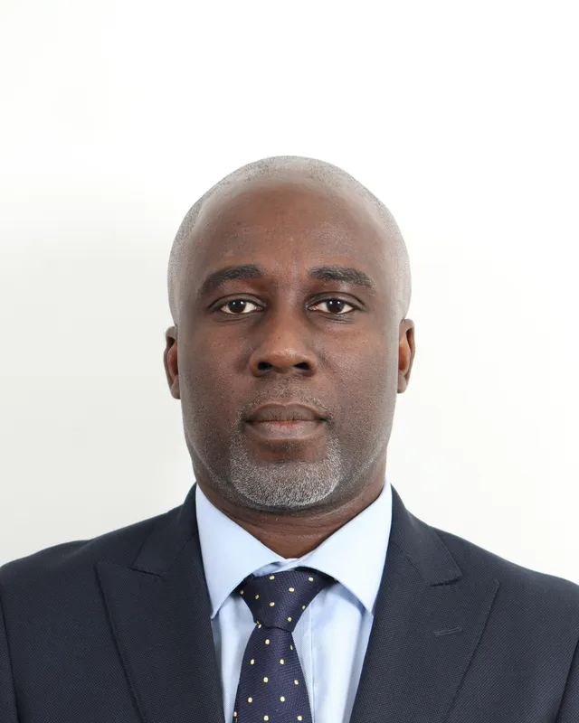 Dr Esson Adobah